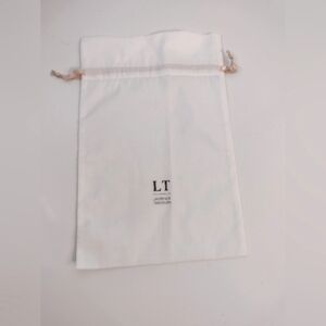 Laurence Tavernier white dust bags
